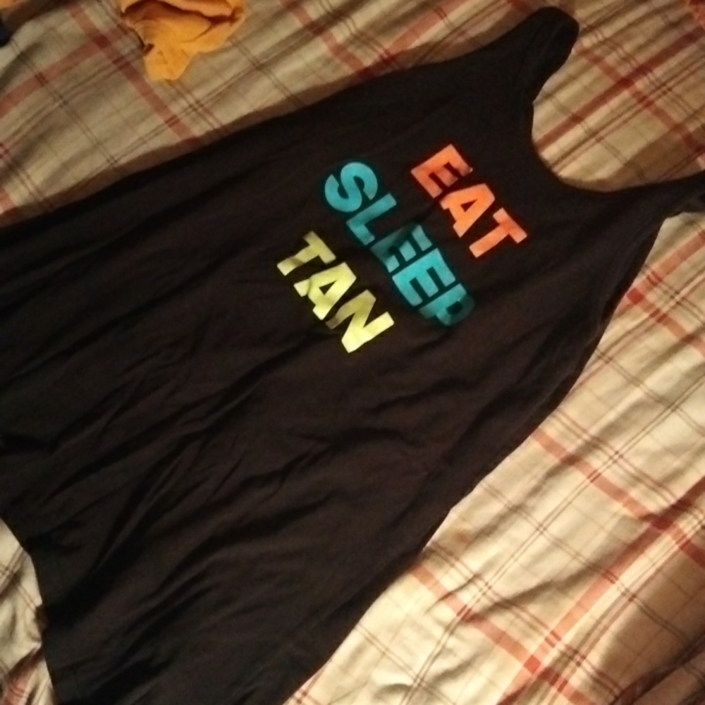 A shirt from Miami Florida bought it from the beach and it is the color black si
